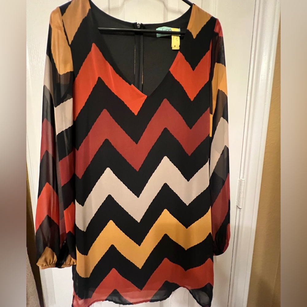 Karlie chevron print long sleeve mini dress, size small. Has a modern mod feel.